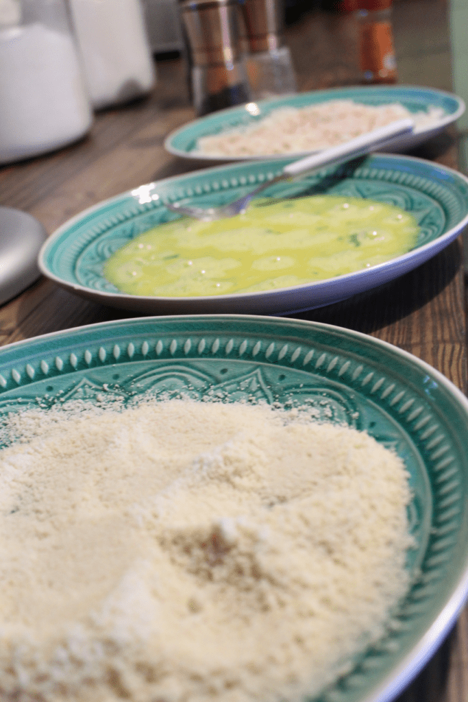 three stage breading station. flour, egg, panko