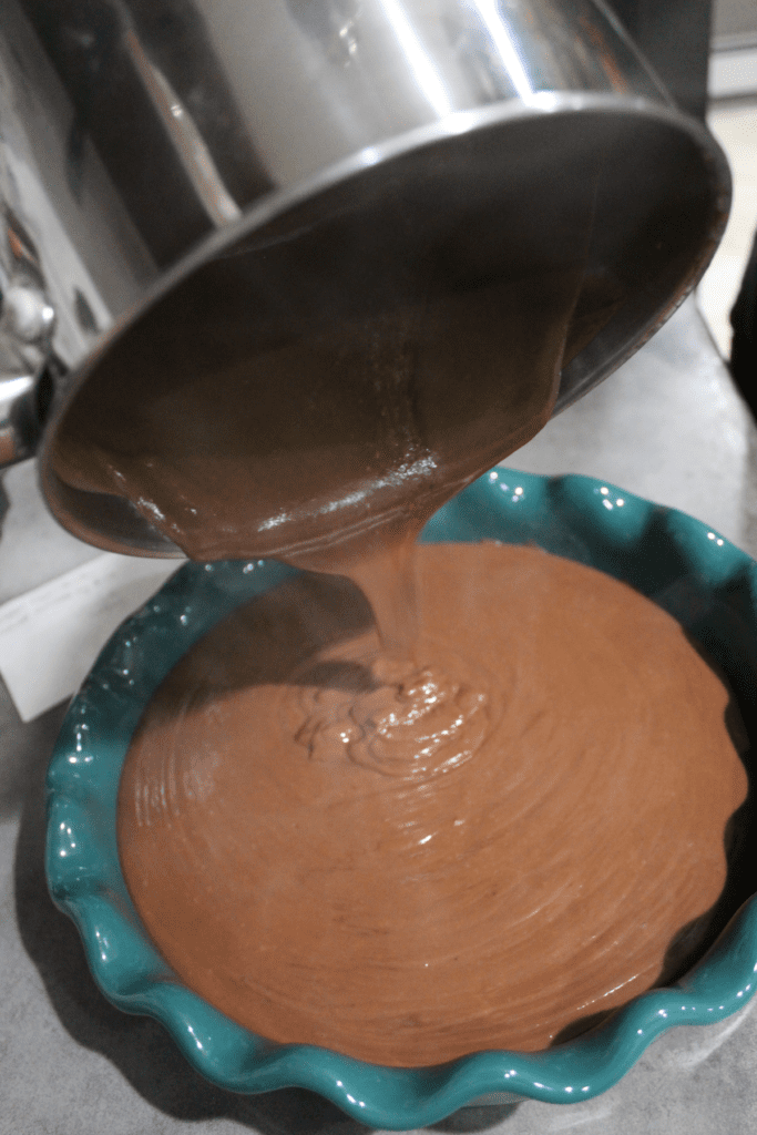 Pouring pudding into the pie dish